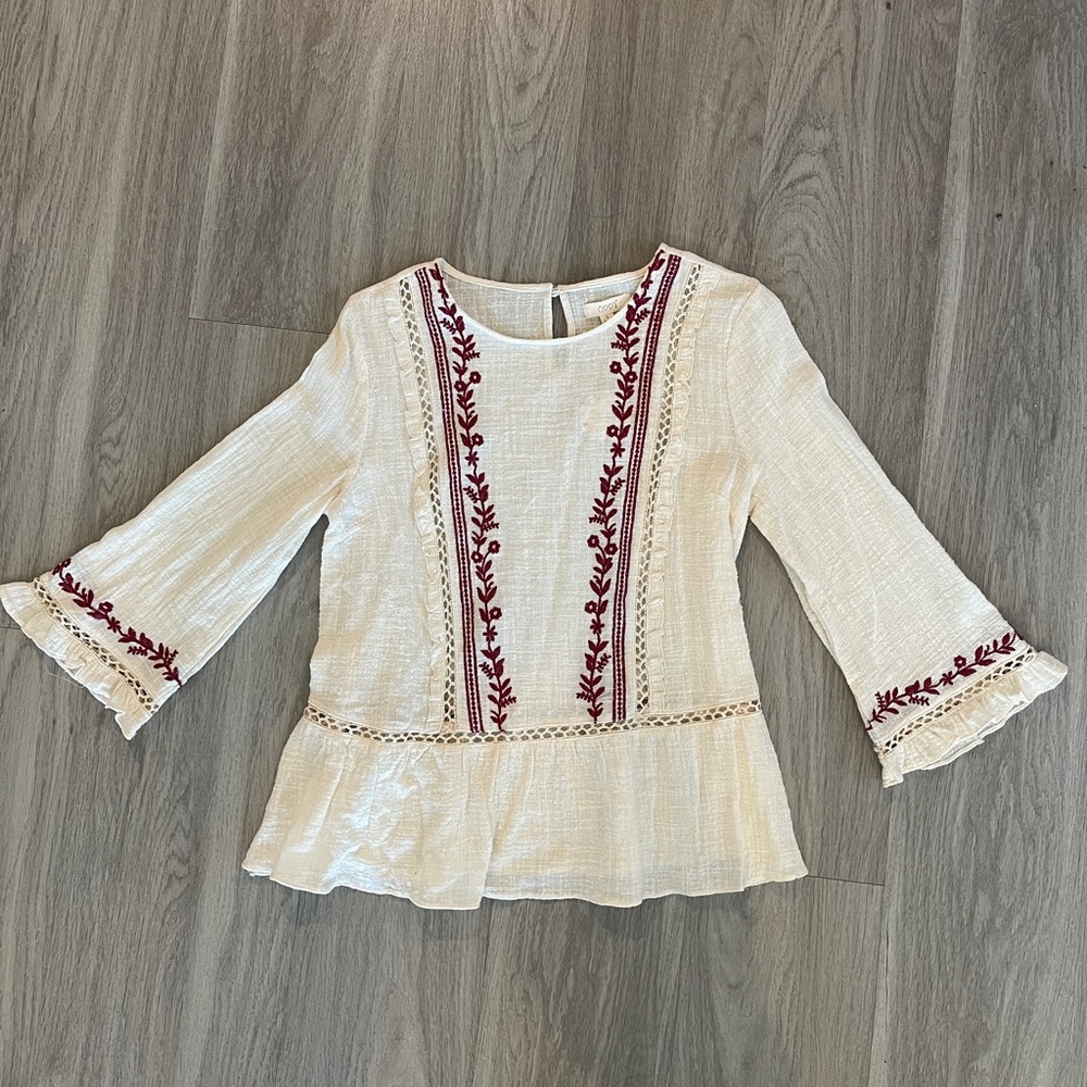 Brand new Embroidered Peplum top
